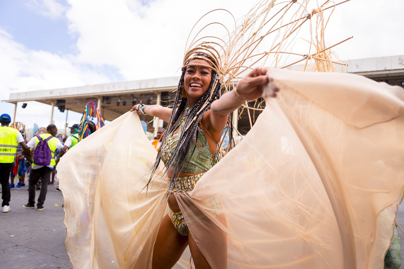 Former Project Runway winner Anya Ayoung-Chee crosses the Savannah stage in the section Bamboo of The Lost Tribe. Photo Credit: Mark Gellineau